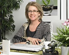 Kathryn sitting at desk