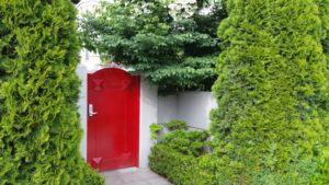 Melissa's Red Door commands attention, yet secures privacy.