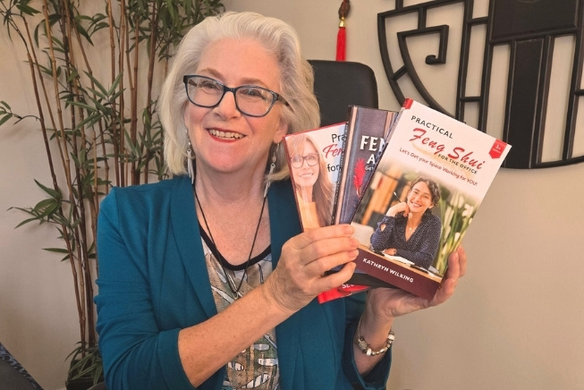 kathryn-wilking-author-of-feng-shui-books kathryn wilking holding her feng shui books that you can purchase on her website